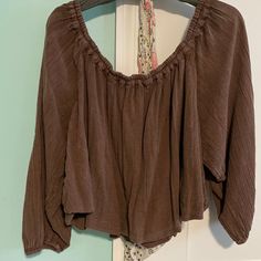 Nwot Free People Top. Chocolate Color. Elastic Waist And Sleeves Brown Cotton Blouse For Spring, Brown Long Sleeve Top For Vacation, Casual Brown Cotton Peasant Top, Summer Brown Blouse For Brunch, Chic Brown Cotton Blouse, Casual Brown Beach Blouse, Brown Long Sleeve Peasant Top For Summer, Summer Brown Long Sleeve Peasant Top, Brown Flowy Tops For Spring