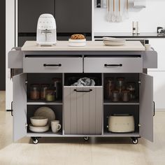 a kitchen island with two storage bins on it's sides and an appliance in the middle