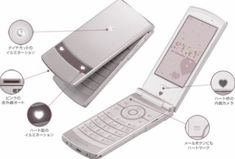 an image of a cell phone with all its components labeled in english and japanese language