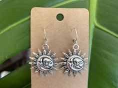 Silver sun & moon small dainty earrings  Earrings are made of sterling silver- will not tarnish or cause allergic reaction  Please note that these earrings do have a little weight to them.  Also available in regular earring hooks upon request Adjustable Sun And Moon Sterling Silver Earrings, Adjustable Sterling Silver Earrings With Sun And Moon Design, Adjustable Sterling Silver Sun And Moon Earrings, Sterling Silver Sun And Moon Adjustable Earrings, Silver Sun And Moon Design Earrings For Gift, Silver Earrings With Sun And Moon Design As Gift, Sun And Moon Design Dangle Earrings For Summer, Sun Moon Earrings, South Lake Tahoe