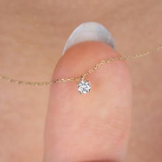 "Show that you value your loved one. Our tiny diamond necklace; It is suitable for daily use, a nice gift for your lover. Shine with this stylish and elegant solitaire necklace. April birthstone necklace 🤍🤍 Special gifts for your special moments. We produce our jewelery for you in the most perfect way. 🤍🤍 All of our products are carefully crafted from 14k Solid gold and Real diamonds. FEATURES * Made to order. * Gold Color Selection: Yellow Gold, Rose Gold, White Gold * Gold KT: 14K * Length Minimalist 14k Gold Diamond Necklace With Prong Setting, Dainty White Gold Birthstone Necklace For Anniversary, Fine Jewelry Diamond Solitaire Necklace With Birthstone, Delicate 14k Gold Solitaire Necklace With Prong Setting, Diamond Solitaire Necklace With Round Cut Birthstone, Classic Diamond Birthstone Necklace For Gift, Classic Diamond Birthstone Necklace Gift, Dainty Round Pendant Diamond Necklace For Anniversary, Minimalist Diamond Solitaire Necklace With Birthstone