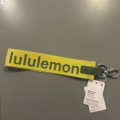 a name tag is attached to a keychain