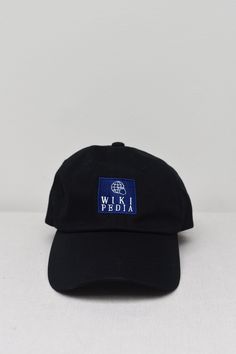 "Wikipedia Embroidered Black Dad hat. This one's got a low profile with an adjustable strap and curved visor. * 100% chino cotton twill * Unstructured, 6-panel, low-profile * 6 embroidered eyelets * 3 ⅛\" (7.6 cm) crown * Adjustable strap with antique buckle * Blank product sourced from Vietnam or Bangladesh" Black Dad Hat, Dad Hat, Trucker Cap, Dad Hats, Low Profile, Cotton Twill, Mood Board, Vietnam, Baseball