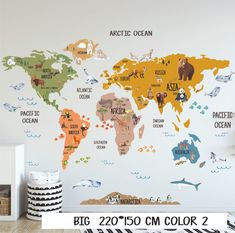 the world map wall sticker is shown with animals and other things in different colors