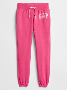 Designed exclusively for Factory Stores. Soft, comfy fleece. Drawcord ties at elasticized waistband. Gap logo at hip. Elasticized cuffs. #360179 Gap Joggers, Hoodie Gap, Gap Logo, Girls Joggers, Pajamas Gift, Girls Fleece, Gap Kids, Kids Pants, Fleece Pants