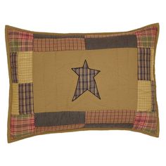 a brown pillow with a black star on the front and plaid backings around it