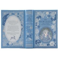 the snow queen and other winter tales book opened to show an image of a woman's face