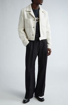 From Amiri's spring '24 runway show comes this texture-rich shirt-jacket cut from a wool-enriched bouclé fabrication bathed in shimmering sequins. 22 1/2" length (size 50 EU) Front button closure Notched collar Button cuffs Chest patch pockets Lined 90% polyester, 10% wool Dry clean Made in Italy Designer Clothing Amiri Jacket Men, Smart Casual Suit, Pleat Pants, Designer Clothing Brands, Boucle Jacket, Pleated Pants, Runway Show, How To Make Tshirts, Notched Collar