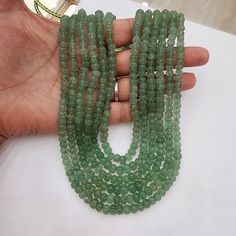 Add a touch of universal elegance with this Six-Layered Emerald Pumpkin Beads Necklace, perfect for both men and women, including groom jewelry. This versatile piece showcases rich, faceted emerald beads in a bold, multi-strand design that radiates sophistication. Ideal for anyone aiming to make a statement, it lends a luxurious and regal touch to any ensemble, suitable for weddings, formal events, or significant occasions. Material : Natural pumpkin shaped Russian quartz with adjustable silk th Groom Jewelry, Pumpkin Beads, Pumpkin Bead, Emerald Bead, Tourmaline Necklace, Emerald Necklace, Pin Pendant, Pendant Rings, Silk Thread