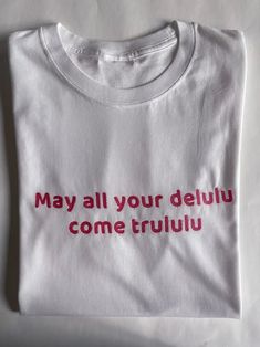 Delulu T-shirt Pink Stretch T-shirt With Text Print, White Stretch T-shirt With Screen Print, Stretch Crew Neck T-shirt With Text Print, White Stretch Graphic Tee, Cotton Stretch T-shirt With Text Print, Stretch Crew Neck T-shirt With Logo Print, Stretch Cotton T-shirt With Logo Print, Pink Crew Neck T-shirt With Embroidered Text, Pink Embroidered Text Crew Neck T-shirt