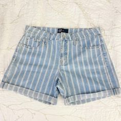 Gap Denim 5” Short Striped Nwot Size: 8/29 Denim Striped Medium Wash/White Stripes Mid-Rise Cuffed Hem-Can Be Unrolled Fits Easy Through Hip And Thigh Front Button And Zip Closure 5 Pocket Style 5” Inseam Inside Label Marked To Prevent Store Returns Gap Cotton Medium Wash Shorts, Casual Cotton Jean Shorts With Rolled Hem, Gap Cotton Cutoff Jean Shorts, Gap Denim Blue Summer Bottoms, Gap Blue Jean Shorts For Summer, Gap Denim Jean Shorts For Spring, Summer Gap Denim Blue Bottoms, Summer Denim Blue Gap Bottoms, Gap Cutoff Shorts For Summer