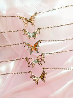 "🦋 Inspired by Season 3 of the animated show Winx, grab these necklaces to wear and flaunt your inner fairy! Chain length is 16\" to 18\" (extendable)! ⭐️ comes with a jewelry box/case, polishing cloth* * based on supply availability ‼️ If you would like to receive individual boxes for each necklace, please mark them as gifts! If an order with more than one necklace is not marked as a gift, it will be packaged with only one box." Cheap Pink Friendship Necklaces, Cheap Pink Charm Necklaces For Friendship, Friendship Necklaces For 2 Dimand, Cheap Iridescent Necklaces As Gifts, Affordable Pink Necklace For Best Friend, Cheap Iridescent Necklace For Gift, Buttercup Necklaces For Couples, Pack Of Necklaces, Butterfly Necklace Fairytopia