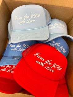 From the USA with love! The perfect hat to rock all summer long! Blue Baseball Cap For Summer Vacation, Summer Vacation Blue Baseball Cap, Summer Blue Snapback Trucker Hat, Blue Summer Vacation Baseball Cap, Blue Snapback Trucker Hat For Summer, Blue Summer Trucker Hat, Adjustable Blue Trucker Hat For Beach, Blue Curved Brim Trucker Hat For Summer, Adjustable Blue Summer Baseball Cap