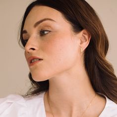 Minimal in design, but feminine in material, the Mother of Pearl Zoe earrings are sure to be a regular in your rotation. Available in 14k gold plated brass Size: 7/16" 9.5mm x 1.5mm Mother of Pearl inlay Stainless steel post with friction back SKU: BYE1091 Timeless Rose Gold Huggie Earrings As Gift, Minimalist Nickel-free Huggie Earrings For Formal Occasions, Minimalist Nickel Free Huggie Earrings For Formal Occasions, Delicate Gold-plated Huggie Earrings For Everyday, Minimalist 14k Gold Hypoallergenic Earrings, Minimalist Gold Plated Drop Huggie Earrings, Timeless Tarnish Resistant Huggie Earrings As Gift, Timeless Tarnish-resistant Huggie Earrings As Gift, Minimalist Yellow Gold Jewelry With Matching Earrings