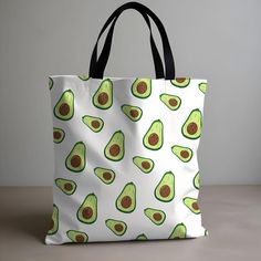 This reusable grocery bag with a fun fruit pattern is the perfect eco-friendly shopping tote for trips to the farmer's market, beach, or grocery store. This sustainable storage bag makes a great zero-waste gift for teachers, moms, or anyone who wants to reduce their environmental impact with a stylish and practical black handle tote bag. 𝐒𝐓𝐘𝐋𝐈𝐒𝐇 𝐀𝐍𝐃 𝐒𝐔𝐒𝐓𝐀𝐈𝐍𝐀𝐁𝐋𝐄: 𝐘𝐎𝐔𝐑 𝐄𝐕𝐄𝐑𝐘𝐃𝐀𝐘 𝐑𝐄𝐔𝐒𝐀𝐁𝐋𝐄 𝐓𝐎𝐓𝐄 𝐁𝐀𝐆  * Available in three sizes with a sleek black handle Beach Bag Gift, Pineapple Bag, Farmer Market, Fun Fruit, Zero Waste Gifts, Everyday Tote, Fruit Pattern, Soft Bristle Brush, Gift Teacher