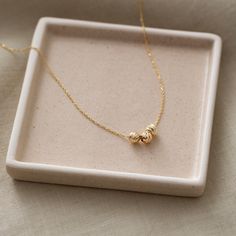 "Three Beads Pendant Necklace in 14K Gold ★ ★ ★Description★ ★ ★ ✓ Material:  14k Real Solid Gold ✓ Available Gold Colors: Yellow Gold, White Gold and Rose Gold ✓ Available Chain Sizes: 14\", 16\", 18\", 20\" ✓ Charm/Pendant Material: Highest Quality Solid Gold ✓ Charm/Pendant Size: Height: 0.20\", Width: 0.60\" ✓ Ready to Ship in 3-4 Business Days ✓ International ★FREE★ Express Shipping 🎁 PERFECT GIFT 🎁 ➤ Suitable for all special occasions: ❤Birthday Gift ❤Anniversary Gift ❤Graduation Gift ❤Br Dainty Round Bead Necklaces For Anniversary, Dainty Round Bead Necklace For Anniversary, Everyday Necklace With Spacer And Round Beads, Everyday Round Beads Necklace With Spacer Beads, Dainty Rondelle Necklace Perfect For Gifts, Gold Necklaces With Round Beads For Mother's Day, Dainty Polished Beaded Necklaces For Gift, Gift Polished Rondelle Beaded Necklaces, Dainty Polished Bead Necklaces For Gifts