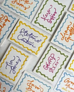 many different colored cards with writing on them