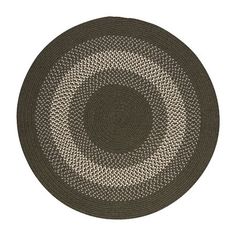 a black and white rug with an oval design on the center, in front of a white background