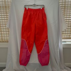 Fun Adidas Trackpants! New With Tags, Never Worn! Trendy Pink Parachute Pants, Trendy Pink Parachute Pants For Spring, Pink Casual Parachute Pants For Summer, Casual Pink Parachute Pants For Summer, Pink High Waist Parachute Pants For Spring, Pink Stretch Parachute Pants With Pockets, Pink Parachute Pants With Pockets For Summer, Spring Pink Pants With Pockets, Pink Sporty Parachute Pants For Spring