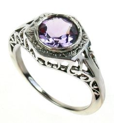 This beautiful Art Deco ring has been crafted in precious metal Platinum. The highlight of this Vintage inspired ring are the gorgeous pierced filigree patterns and etched patterns around the bezel of the centre gemstone completing this feminine ring. The centre stone is a NATURAL Amethyst which has been elegantly claw set. THIS VINTAGE INSPIRED AMETHYST RING IS TRULY AN EXQUISITE FINE JEWELLERY PIECE WHICH IS TO BE TREASURED FOR A LIFETIME ! * FREE GIFT BOX PROVIDED * ALL ITEMS PACKAGED IN BUBB Classic Amethyst Crystal Ring For Anniversary, Art Deco Bezel Setting Ring For Promise, Classic Amethyst Ring With Round Cut, Classic Amethyst Crystal Formal Ring, Classic Amethyst Crystal Ring For Formal Occasions, Victorian Amethyst Ring With Accent Stones For Formal Occasions, Classic Sterling Silver Amethyst Ring With Center Stone, Heirloom Style Purple Amethyst Ring With Bezel Setting, Heirloom Purple Amethyst Ring With Bezel Setting