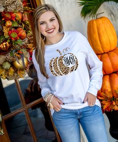 We are in love with this monogrammed leopard pumpkin graphic t-shirt! Make it your own by choosing from a t-shirt, v-neck t-shirt, long sleeve, tank top, or even a sweatshirt! We also offer your favorite brands Gildan, Bella Canvas or Comfort Colors! The options are endless!    break:specs  GILDAN Short Sleeve - 6.0 oz. pre-shrunk 100% cotton Long Sleeve - 6.0 oz. pre-shrunk 100% cotton V-Neck - 4.5 oz. pre-shrunk 100% ring spun cotton Tank Top - 5.3 oz. pre-shrunk 100% cotton Sweatshirt - 8 oz Fall Monogram Shirt, Fall Leopard Print Cotton Tops, Leopard Print Cotton Tops For Fall, Fall Leopard Print Tops With Letter Design, Fall Leopard Print Top With Letter Details, Fall Leopard Print Graphic T-shirt, Fall Monograms, Pumpkin Graphic, Monogram Shirt