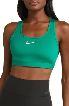 Work up a sweat on and off the pickleball court in this padded sports bra featuring wide straps and signature moisture-wicking tech. Racerback Dri-FIT moisture-wicking technology Lined 72% polyester, 28% spandex Machine wash, line dry Imported Green Sports Bra With Built-in Padding For Gym, Green Sports Bra With Built-in Padding For Training, Green Sports Bra With Built-in Padding, Sports Bra With Built-in Padding For Medium Support, Padded Activewear For Sports Events, Green Athleisure Sports Bra With Built-in Padding, Padded Athleisure Activewear For Light Sports, Padded Athleisure Activewear For Sports, Padded Fitted Sportswear Activewear