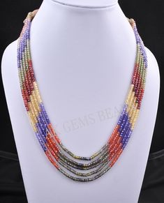 PRODUCT DETAILS: AAA Multi Cubic Zirconia 5 Strand Faceted Rondelle Beaded Necklace Jewelry Stone Name :- Cubic Zirconia ( Green, Orange, Blue, Yellow, Red, Brown ) Bead Size :- 3mm Length :- 13 to 15 Inches Bead Shape :- Rondelle Bead Type :- Faceted Quality :- AAA (Excellent) Treatment :- Natural 2. NECKLACE LENGTHS :- 1st Strands :- 13 Inches 2nd Strands :- 13.5 Inches 3rd Strands :- 14 Inches 4th Strands :- 14.5 inches 5th Strands :- 15 inches More Fine Shop Gemstones Gemstone Cubic Zirconia Minimalistic Jewelry, Beaded Scarf, Gemstone Beads Wholesale, Scarf Necklace, Gemstone Beads Jewelry, Jewelry Making Necklace, Semi Precious Jewelry, Gemstone Beaded Necklace, Jewelry Simple