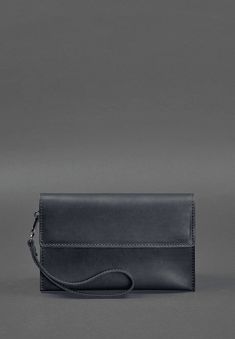 For the man who values elegance and craftsmanship, this Classic Designer Handcrafted Leather Men's Clutch Bag is the ultimate accessory. Meticulously made from premium leather, it combines a sleek, compact design with practical functionality. Perfect for carrying essentials such as a phone, wallet, and documents, this clutch is both stylish and versatile. With its timeless design and artisanal quality, this clutch adds a refined touch to any outfit, from formal business attire to casual wear. It Black Soft Leather Formal Wallets, Formal Business Attire, Men Clutch Bag, Man Clutch, Black Textured Leather Rectangular Wallet, Black Leather Wallet Hand-stitched, Black Leather Wallet For On-the-go, Luxury Black Leather-lined Clutch, Blank Notes