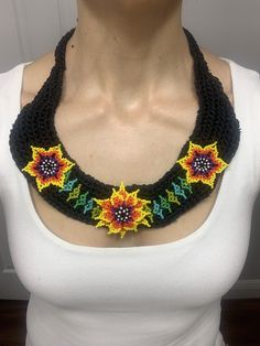 Beautiful hand made thread necklace with beaded flowers Adjustable Choker Necklace With Flower Decoration, Adjustable Flower Decoration Choker Necklace, Colorful Beaded Flower Necklace For The Beach, Colorful Beaded Flower Necklace For Beach, Bohemian Flower Necklace With Round Beads For Beach, Bohemian Beach Flower Necklace With Round Beads, Colorful Flower Necklace For Beach, Adjustable Handmade Flower Necklace, Traditional Adjustable Flower Beaded Necklace