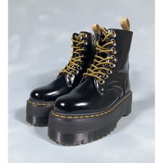 Elevate Your Shoe Game With These Stylish Dr. Martens Jadon Max Combat Platform Boots In Black. Crafted From Vegan Leather, These Boots Feature A Round Toe Shape And Lace-Up Plus Zip Closure For A Secure Fit. The 2-Inch Platform Height And Low Block Heel Provide Both Arch Support And Comfort, Making Them Perfect For Travel, Casual Wear, And Work. These Limited Edition Boots Also Boast A Slip-Resistant Rubber Outsole, Cushioned Insole, And Non-Slip Surface. The Dr. Martens Logo Accents And Solid Luxury Black Lace-up Boots With Lug Sole, Luxury Black Lace-up Boots With Round Toe, Formal Black Boots With Laces, Black Formal Lace-up Boots With Lug Sole, Luxury Black Platform Boots With Lug Sole, Black Patent Leather Boots With Lug Sole, Black High Ankle Platform Boots With Laces, Luxury Black Lace-up Boots With Reinforced Heel, Luxury Black Lace-up Boots