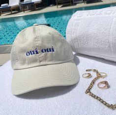 Oui, oui! Say Bonjour to your new everyday essential with our exclusive Hail The Maison seasonal cap. Dreamt of in France, Designed in house and made in California, we couldn’t be more proud of these chic beauties to celebrate the nostalgic life with. Created with 100% Cotton, Hand embroidered and made with care. * Sandy colored base with royal blue embroidery * One size fits most * Self-fabric strap with hook and loop closure* Soft hand feel with brushed look Merch Ideas Products, Acai Shop, Aesthetic Caps, Cap Pics, Cap Photography, Royal Blue Fashion, Cap Store, Denim Cap, Embroidery Caps