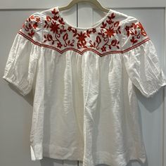 Thml Embroidered Burnt Orange Top Size Xs; Nwot Mint Condition Never Worn; Key Hole Single Opening Button On Back Neck White Short Sleeve Embroidered Spring Top, White Short Sleeve Embroidered Top For Spring, White Embroidered Short Sleeve Top For Spring, White Embroidered Top With Short Sleeves For Spring, Casual White Blouse With Floral Embroidery, Spring Crew Neck Top With Embroidered Neckline, White Crew Neck Top With Floral Embroidery, White Casual Top With Floral Embroidery, Spring Embroidered Neckline Crew Neck Top