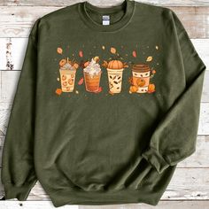 Fall Coffee Sweatshirt for Women, Vintage Thanksgiving Sweater, Fall Crewneck Pumpkin Spice Sweatshirt Introducing our cozy and stylish Fall Coffee Pumpkin Spice Sweatshirt, the ultimate must-have for the upcoming autumn season! Embrace the warmth and charm of fall while sipping your favorite pumpkin spice latte in this delightful sweatshirt. Design: Our sweatshirt features a rich, earthy color palette inspired by the changing leaves of fall. The base color is a warm, inviting shade of pumpkin o Coffee Color Crew Neck Top, Relaxed Fit Coffee Color Tops For Fall, Coffee Crew Neck Top For Loungewear, Coffee Colored Tops With Letter Print For Fall, Coffee Letter Print Tops For Fall, Coffee-colored Graphic Print Sweatshirt For Fall, Coffee Color Cotton Sweatshirt For Fall, Casual Coffee Sweatshirt For Fall, Coffee Cotton Sweatshirt For Fall