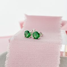 Sterling Silver 6mm Stud earring set with an Emerald CZ. Get size and impact without the price of an Emerald or Diamond. The rich green color is perfect for those born in May! D E T A I L S * 6mm Round CZ * Butterfly Push Back * Sterling Silver * 11mm Post More Stud Earrings * https://etsy.me/3buPBpX Green Birthstones * https://etsy.me/2wFYE7S Birthstone Styles * https://etsy.me/39dsZsN More Earrings * https://etsy.me/2wZKa2D More From Our Shop * https://etsy.me/2vasKjo Are you new to Etsy? Shop Green Stud Earrings, Infinity Knot Ring, Wedding Ring Finger, Born In May, North Star Necklace, Love Knot Ring, Solitaire Studs, Gold Filled Ring, Rich Green