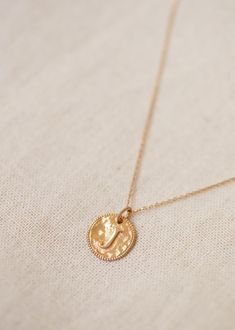 Gold medal 375 thousandths / 9 carats;Letters in relief melted into the hammered medal;Contour of the medal in millegrain;Diameter 1 cm / 0.39 in;Thickness 1.2 mm / 0.05 in;The oval pendant ring allows you to hang several medals on the same chain Gold Letter Pendants, Letter J, Letter I, Jewelry Design Necklace, Letter Pendants, Gold Letters, Oval Pendant, Pendant Rings, Gold Gold