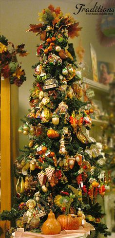 a decorated christmas tree with ornaments on it