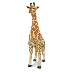 a stuffed giraffe is standing in front of a white background