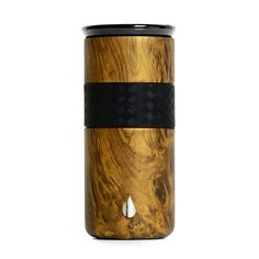 a wooden container with a black band around it