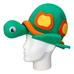 a green and orange hat on top of a head