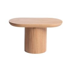 a wooden table with a round top on a white background and no people around it