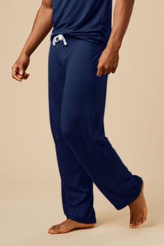 For under the covers or around the house, these ultra-soft pajama pants drape so gently that you barely feel them on. A drawstring only waistband ensures maximum comfort as you adjust the waist to your size. The soft stretchy fabric, tie waistband, and cut of this style makes them an ever so slightly generous fit. If you find yourself between sizes, we recommend sizing down. Made in Canada. 93% Viscose from Bamboo / 7% Spandex. S (28-32/33), M (33/34-36), L (36-38/40), XL (40-42). Comfy relaxed Casual Solid Color Sleep Pants, Long Pants Sleepwear With Elastic Waistband, Casual Sleepwear With Soft Touch And Relaxed Fit, Sporty Sleepwear With Elastic Waistband For Relaxation, Solid Pants With Elastic Waistband For Sleep, Relaxed Fit Loungewear Sleepwear With Drawstring, Casual Solid Color Sleepwear With Elastic Waistband, Relaxed Fit Drawstring Sleepwear For Loungewear, Relaxed Fit Sleepwear With Drawstring For Loungewear