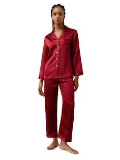 Relax and unwind after a busy day and slip into the Long Sleeve Button-Down Silk Pajama Set. The long-sleeved button-front shirt will feel like second nature against your skin. The matching pants have a relaxed and comfortable fit making them easy to slip on. 22 Momme Charmeuse Silk Glossy Smooth Soft Elegant Long Sleeve Sets With Relaxed Fit, Relaxed Fit Long Sleeve Sleepwear With Buttons, Elegant Long Sleeve Relaxed Fit Set, Elegant Relaxed Fit Long Sleeve Sets, Long Sleeve Loungewear Sets With Button Closure, Red Long Sleeve Sets With Buttons, Long Sleeve Pajama Set With Buttons, Long Sleeve Pajama Party Set With Buttons, Classic Long Sleeve Pajama Party Sets