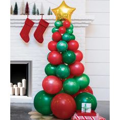 a christmas tree made out of balloons and stockings