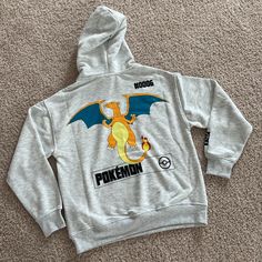 Nwt. In Perfect New Condition. Authentic Pokmon Licensed From Zara. Length 23”. Shoulder 20”. Chest 20.25”. Sleeve 21.5”. Light Gray Color. Size 13 Yrs But Runs Small I’m Selling As 10-12 Yrs Old Size. Comfortable And Cute. Great For Pokmon Fans. 67% Polyester 33% Cotton. No Trades Casual Sports Hoodie With Character Print, Casual Graphic Print Sweatshirt For Playwear, Streetwear Hoodie With Pockets, Hoodie Zara, Zara Winter, Minnie Mouse Sweatshirt, California Sweatshirt, Zara Sweatshirt, Colorful Sweatshirt