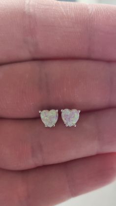 These are beautiful Opal Heart Stud Earrings set in solid 14Kt Gold. This is the perfect gift for mom, wife, fiancee, girlfriend, valentine, daughter, family or friend. It is a special gift for mother's day, valentine's day, wedding, anniversary, birthday, Christmas, Easter, New Year's and any holiday. Solid 14Kt Gold 6mm Created Pink Opals (Amazing Fire) Comes with pushbacks Comes in jewelry box MATCHING PENDANTS, BRACELETS AND RINGS AVAILABLE Wedding Heart-shaped Fine Jewelry Earrings, White Heart Cut Jewelry For Wedding, White Heart-cut Earrings For Valentine's Day, White Heart Cut Earrings For Valentine's Day, White Heart Earrings With Prong Setting, White Heart-shaped Gemstone Jewelry, White Gold Heart Earrings For Wedding, White Heart Cut Earrings For Anniversary, White Gemstone Bridal Earrings As Gift