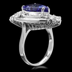 7.20 Carats Natural Very Nice Looking Tanzanite and Diamond 14K Solid White Gold Ring Suggested Replacement Value: Approx. $7,900.00 Total Natural Pear Shaped Tanzanite Weight is: Approx. 5.00 Carats Tanzanite Measures: Approx. 14.00 x 9.00mm Natural Round Diamonds Weight: Approx. 2.20 Carats (color G-H / Clarity SI1-SI2) Ring total weight: Approx. 8.2 grams Disclaimer: all weights, measurements and colors are approximate and may vary slightly from the listed dimensions or as seen in the image. Formal Trillion Cut Diamond Ring With Gemstone, Elegant Pear-shaped Gemstones For Formal Occasions, Trillion Cut Diamond Ring With Gemstone For Formal Occasions, Gia Certified Trillion Cut Formal Rings, Formal Gia Certified Trillion Cut Ring, Gia Certified Trillion Cut Diamond Ring For Formal Events, Gia Certified Trillion Cut Diamond Ring For Formal Occasions, Luxury Diamond Gemstones For Formal Occasions, Gia Certified Luxury Pear-shaped Jewelry