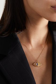 L'Atelier Nawbar's 'Eye On Biladi' necklace is meant to celebrate the beauty of your heritage as the arabic term 'Biladi' translates to 'my country.' Made from 18-karat gold, it's strung with a small pendant featuring an evil eye that's inlaid with lapis lazuli and traced with sparkling diamonds. Yellow Gold Pendant Jewelry With Diamond Eyes, Yellow Gold Evil Eye Jewelry, Gold Evil Eye Necklace In Fine Jewelry Style, Luxury Gold Necklaces With Evil Eye, Luxury Gold Necklaces With Evil Eye Detail, Gold Evil Eye Fine Necklace, Gold Evil Eye Necklace Fine Jewelry, Luxury Gold Evil Eye Necklaces, Yellow Gold Plated Necklaces With Diamond Eyes