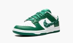 The Women’s Nike Dunk Low “Green Paisley” is a women’s-exclusive colorway that switches up the design of the Swoosh branding on the classic basketball and lifestyle shoe.  From Nike’s Spring 2022 release cycle, the “Green Paisley” features the same two-tone color block of many legendary Dunk styles, albeit with a modified green paisley Swoosh on the sides that replaces the model’s standard leather branding.  The upper is complete white a white leather base with contrasting green leather overlays Dunk Low Paisley, Womens Dunk Low, Shoe Palace, Green Paisley, Nike Brand, Mens Lifestyle, Bandana Print, Nike Dunk Low, Green Shoes