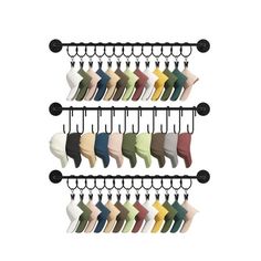 a rack with several pairs of socks hanging from it's hooks, all in different colors