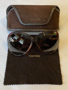 Beautiful vintage sunglasses Design Tom Ford, Model Simone TF/4 C34 63 Italy 90s. Glasses with brown lenses, purple plexiglas frames, plexiglas arms, all signed. Excellent condition, like new No scratches on the glass. They come with an original second-hand box. All products in our shop are guaranteed to be 100% original and authentic. The product that will be shipped is exactly what you see in the picture. Measures: Glass height - 6 cm Front length - 13.5 cm Distance between the arms - 13 cm Co 90s Glasses, Gucci Clutch Bag, Sunglasses Tom Ford, Sunglasses Design, Gucci Clutch, Gucci Glasses, Gucci Horsebit, Tom Ford Sunglasses, Gucci Sunglasses